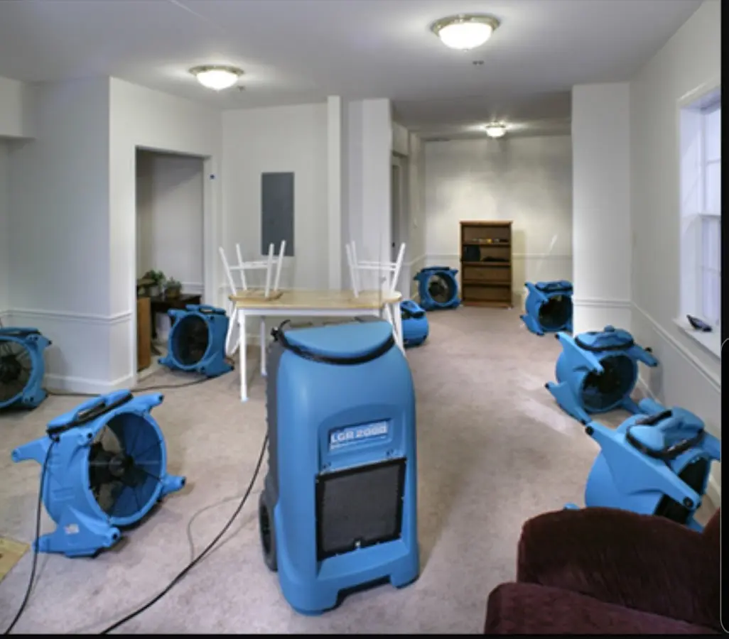 Air movers and dehumidifier setup for Water Damage Restoration in East St. Louis